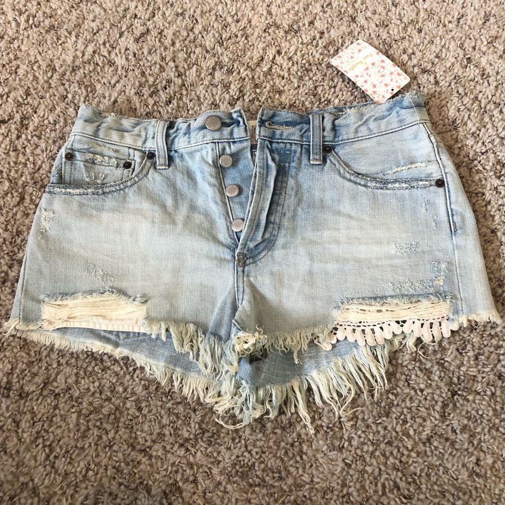 Free People light denim jean shorts